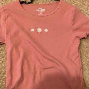 pink crop top with daisy’s